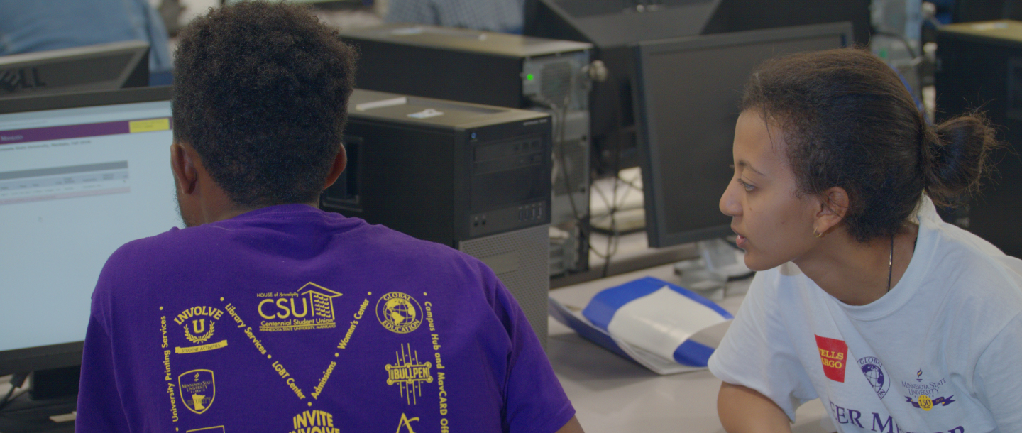 Two students peer mentoring in the classroom