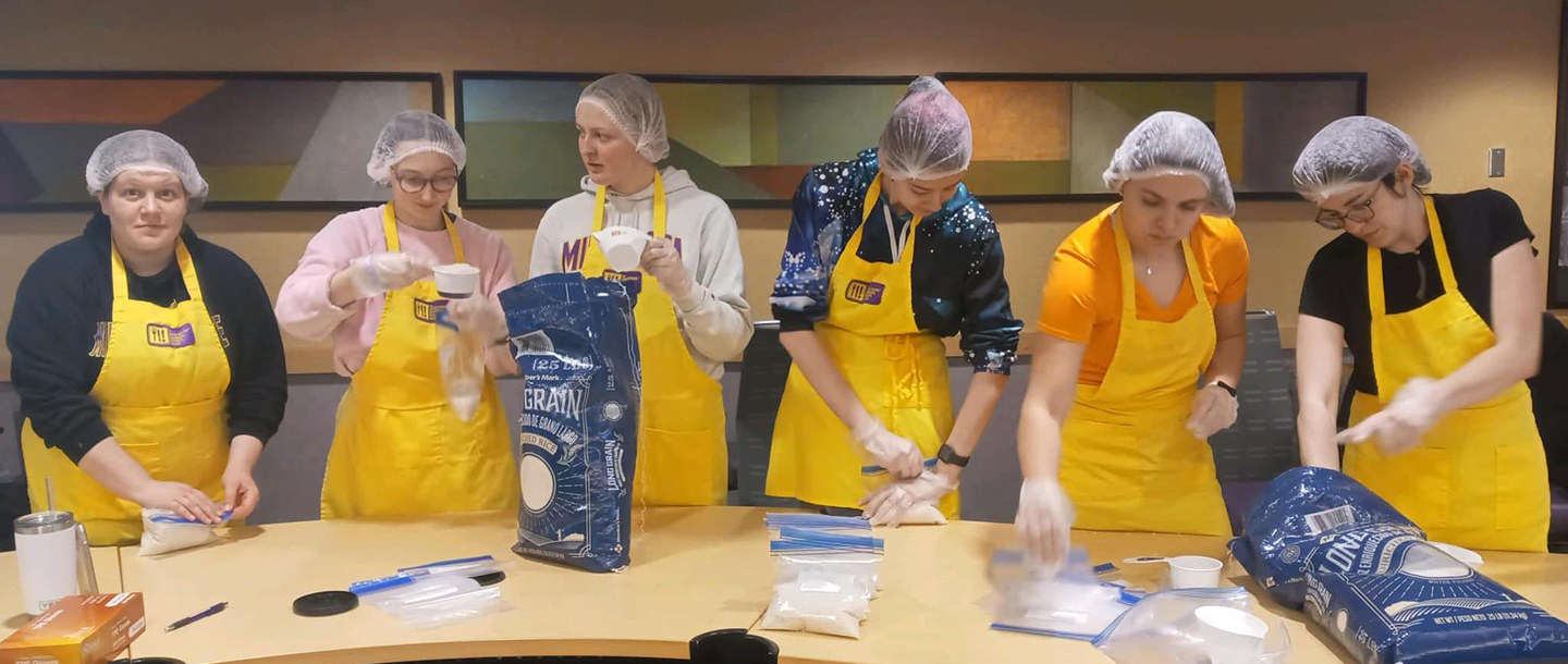 Portioning rice bags for donation to local food pantries