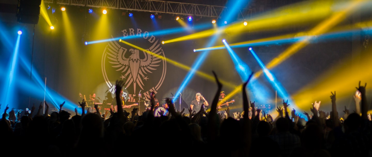 Crowd with their hands raised in the air at the Jerrod Niemann concert on campus
