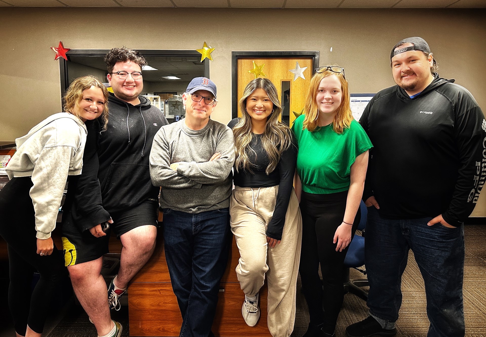 a group of people posing for a photo