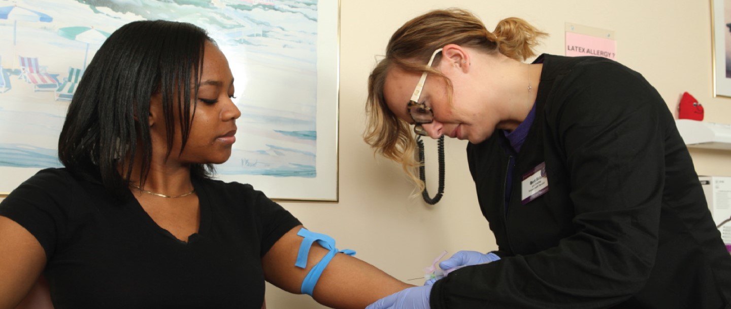 female lab tech with female student