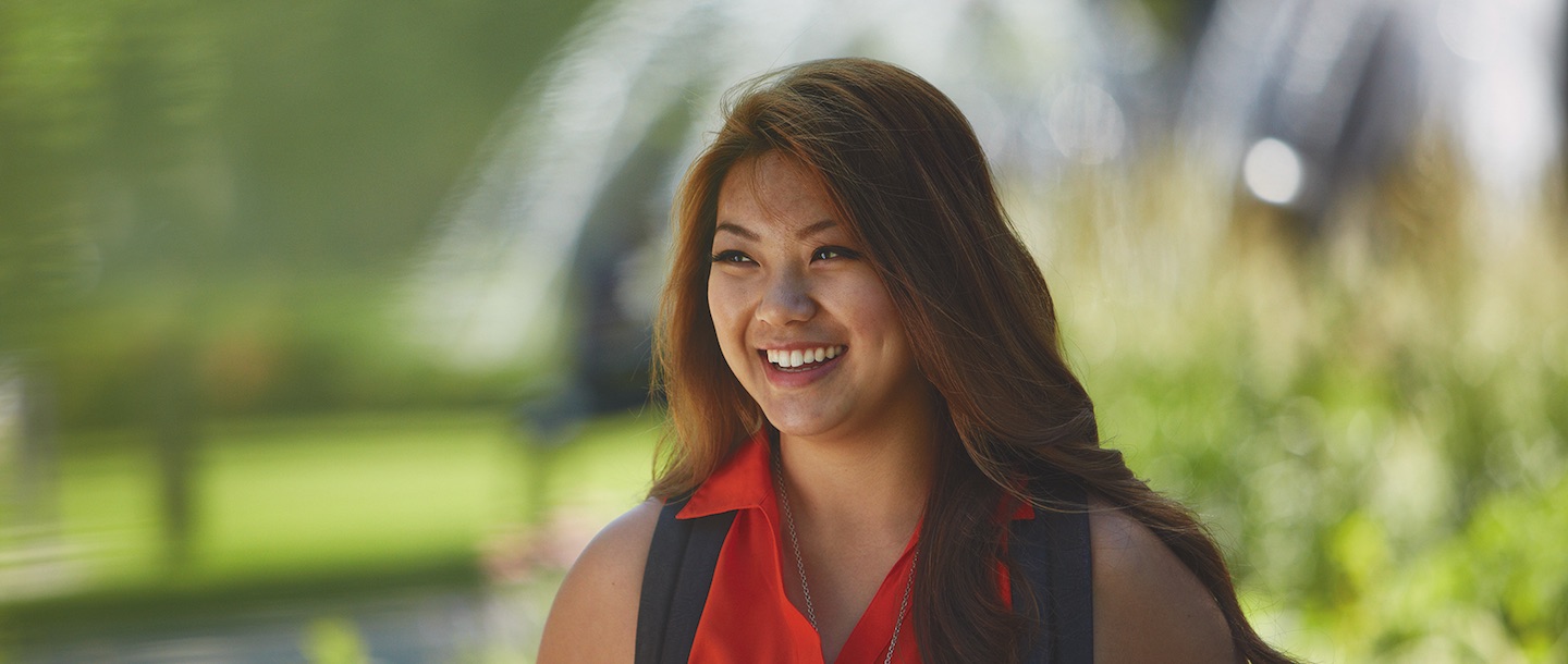 student by fountain