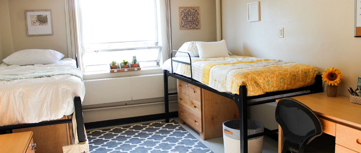 A two beds residential campus room for students.