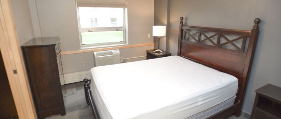 View of bedroom inside the G Hall Resident staff apartment