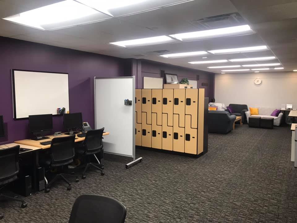 a room with lockers and computers