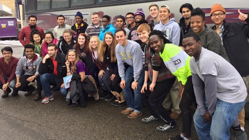 a group of people posing for a photo