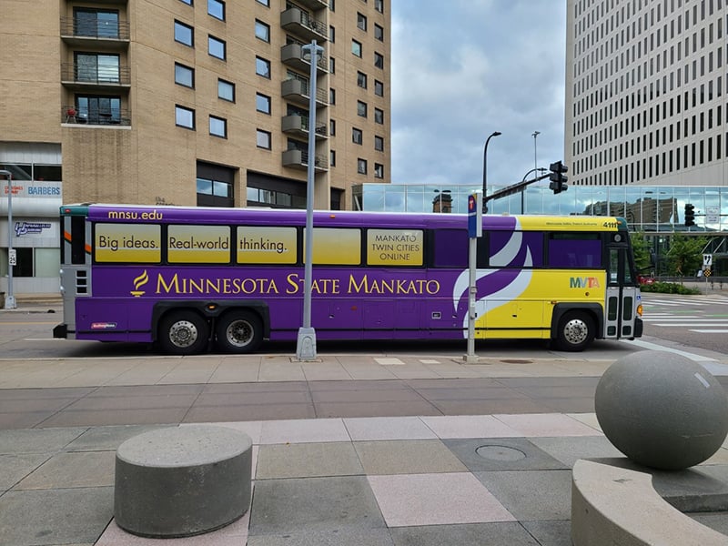 Bus wrapped in Minnesota State Mankato branding